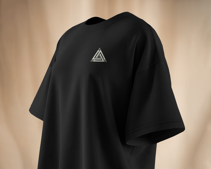 Close-up of Glitched Reality T-Shirt triangular chest design logo