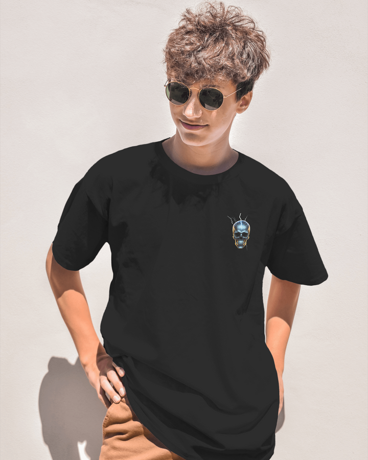 Model wearing Resilience Skull Black Oversized T-Shirt for men in a casual pose front view