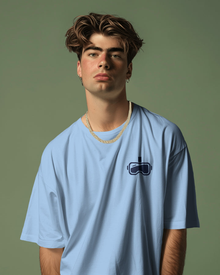 Model with blue Beyond Reality white oversized T-shirt